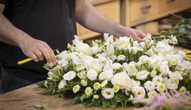 symbolic meanings behind white lilies in funeral flower arrangements